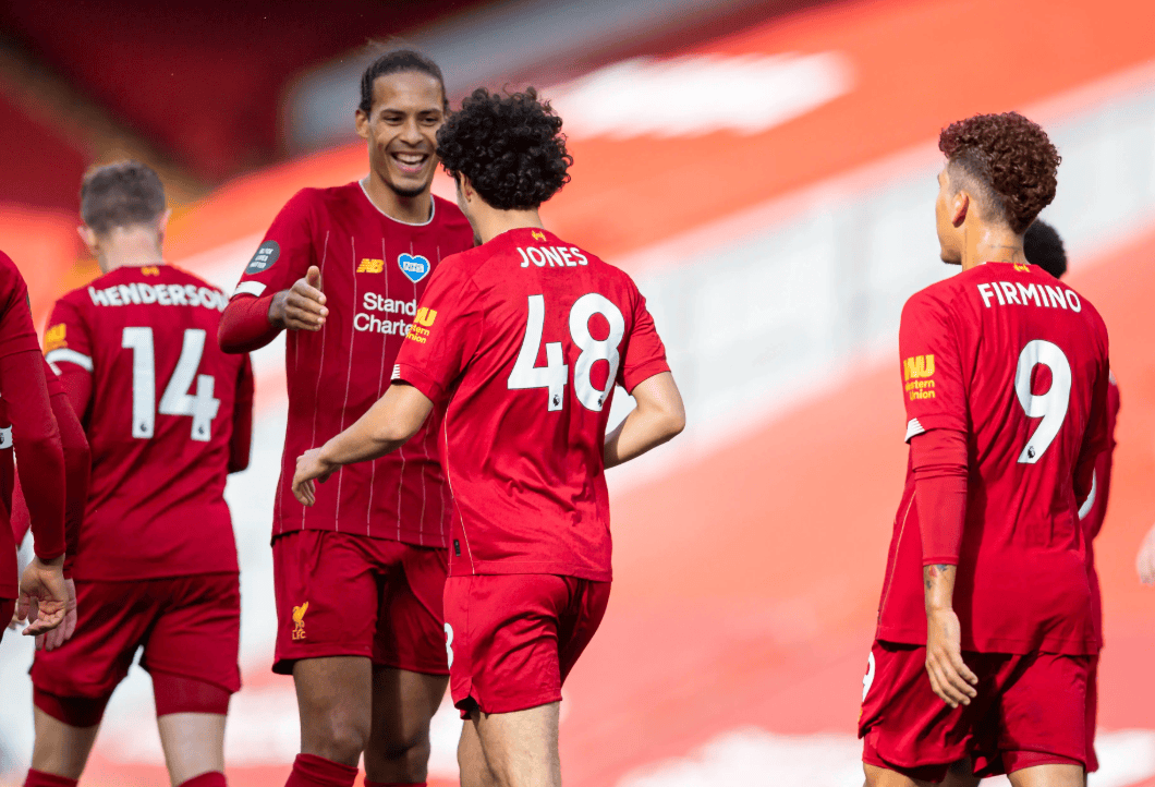 利物浦在比赛中展现出强大的团队配合 利物浦在比赛中展现出强大的团队配合